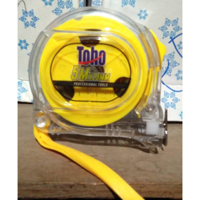 Jual Meteran bangunan merk Toho model transparan putih ukuran panjang 5 ...