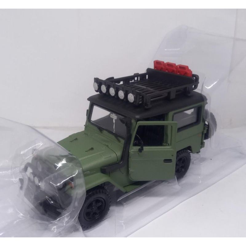 Motormax Toyota FJ 40 Land Cruiser Hardt. verde w modello auto 79323 1:24