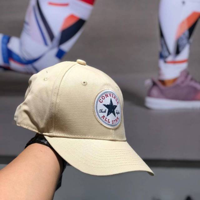 Topi converse cream store
