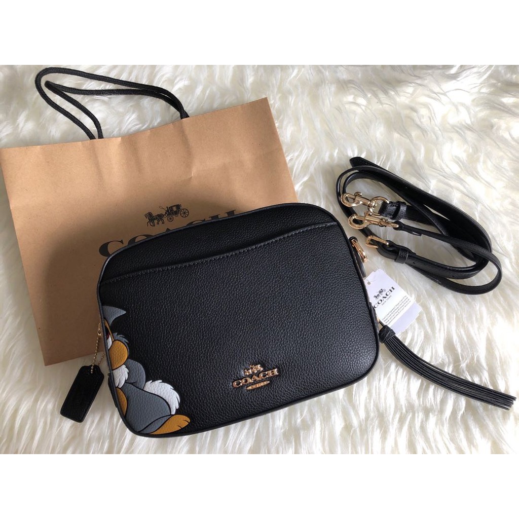 Disney x coach camera bag with thumper hot sale