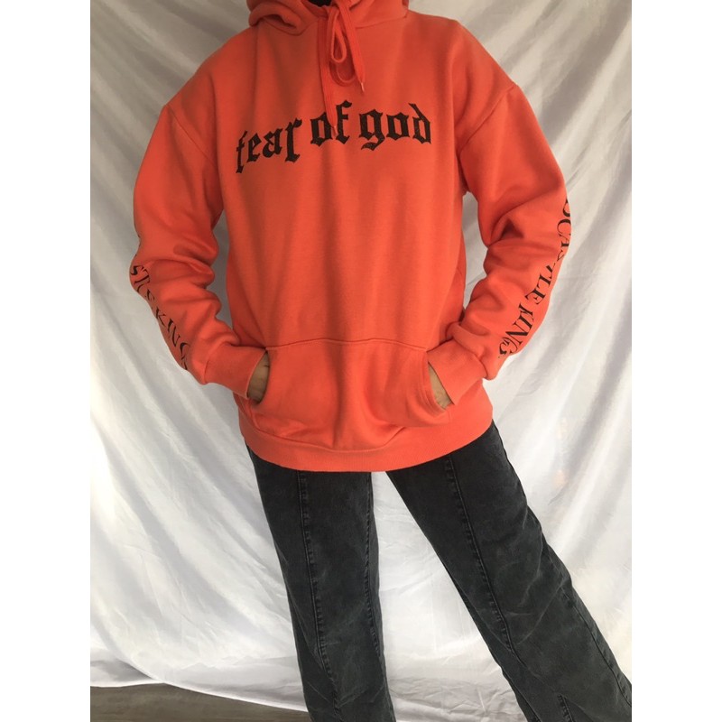 Fear of god outlet orange hoodie