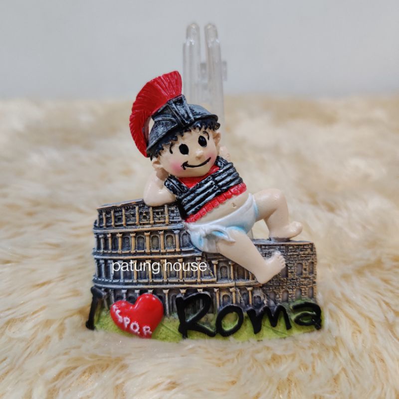 Rome tourism, souvenir fridge magnets on sale outside a shop in the