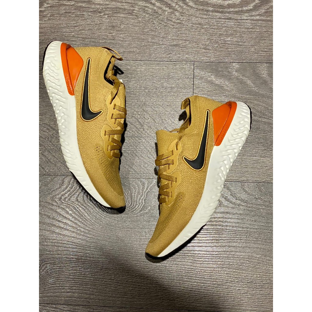 Nike epic react flyknit 2 club gold best sale