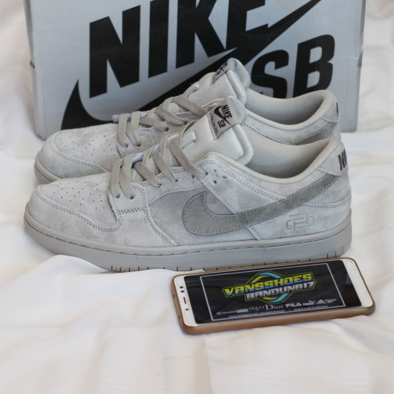 Nike dunk sb on sale x reigning champ