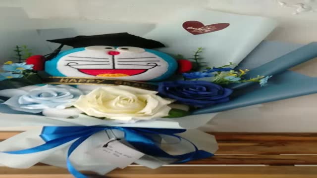 Jual buket boneka doraemon, buket wisuda, kado ulang tahun, wisuda ...