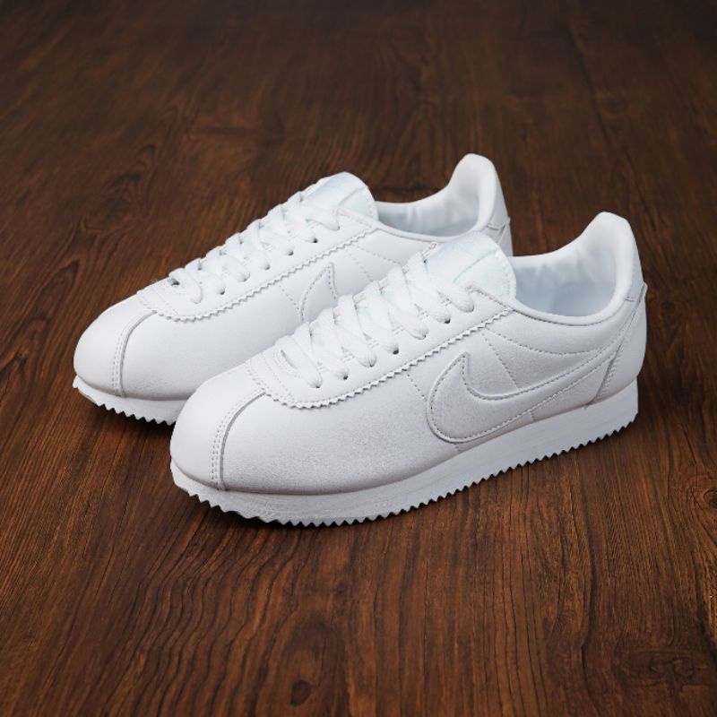 Nike triple white cortez hot sale