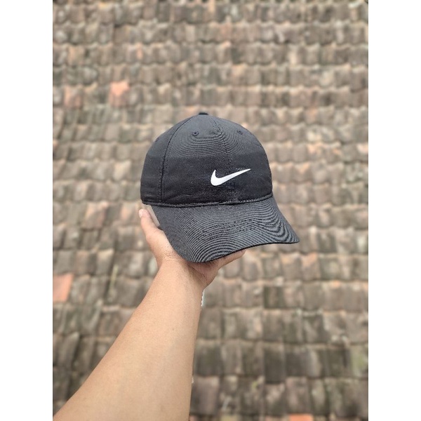 Topi store golf nike