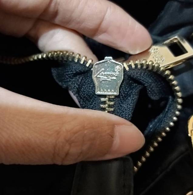 Lampo zipper prada hotsell