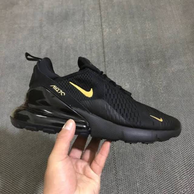 Nike 27c shop black and gold