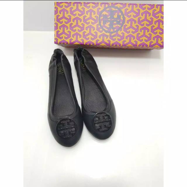 Ciri sepatu tory burch original best sale