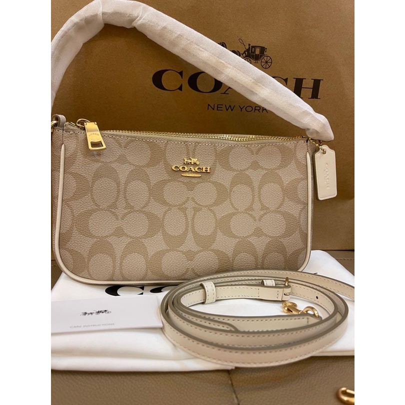 Jual Tas Wanita CO TOP HANDLE POUCH IN SIGNATURE CHALK | Shopee Indonesia