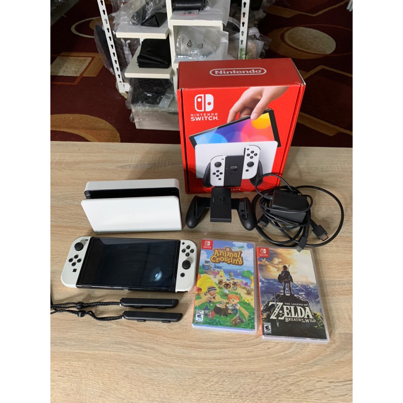 Jual Nintendo switch OLED OFW fullset dan kaset animal Crossing dan