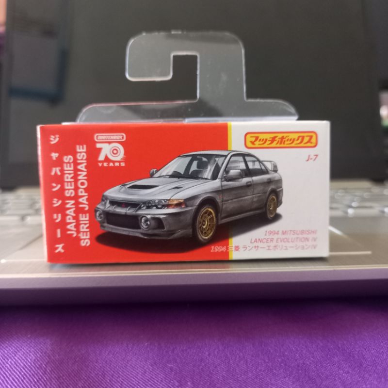 Modellino Auto Matchbox Mitsubishi Lancer Evolution IV 1996 - Colore Blu, Con Parti Mobili