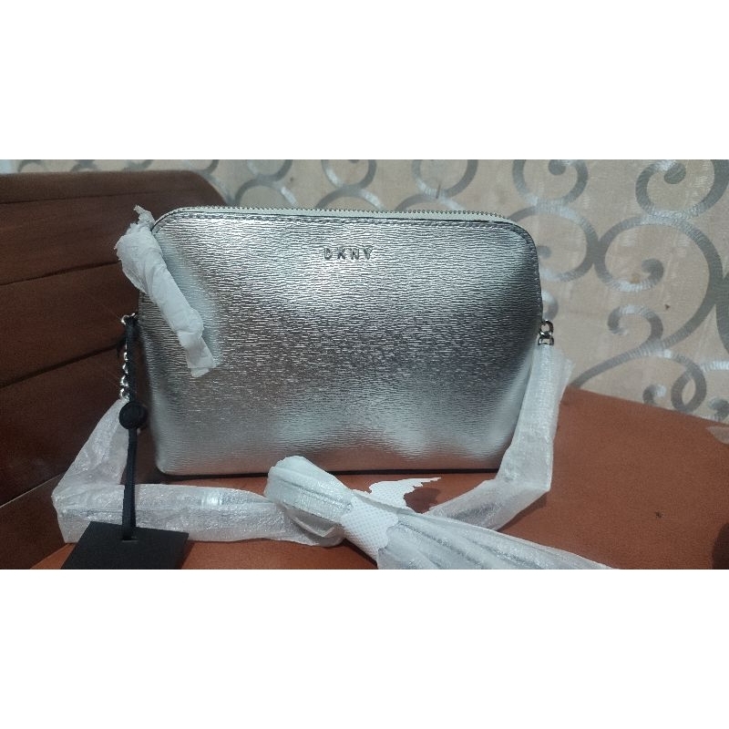 Jual SLINGBAG WANITA DKNY BRYANT DOME METALLIC SILVER ORIGINAL Shopee
