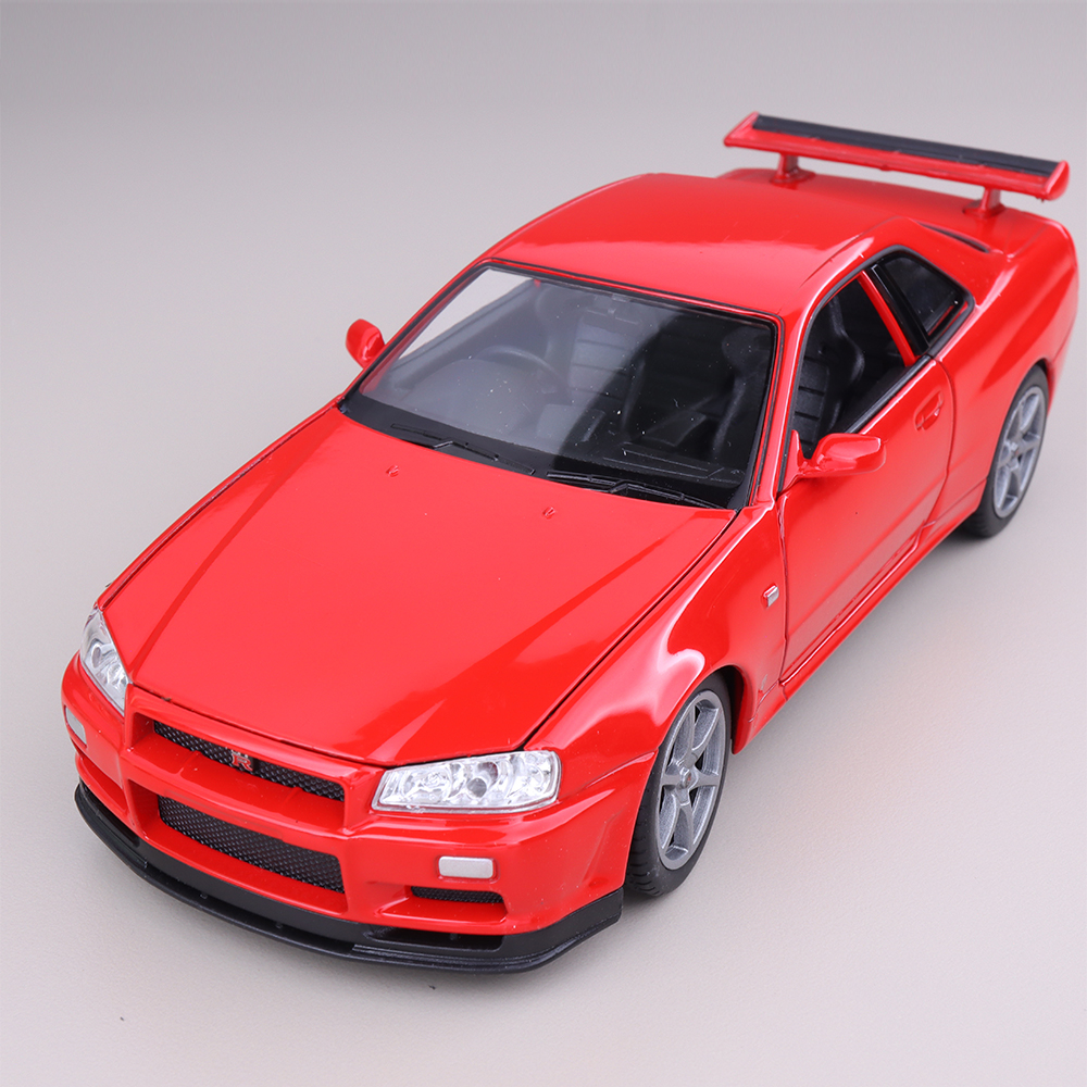 Jual Miniatur Mobil Welly Nissan Skyline GT-R R34 Red Diecast Skala 1: ...