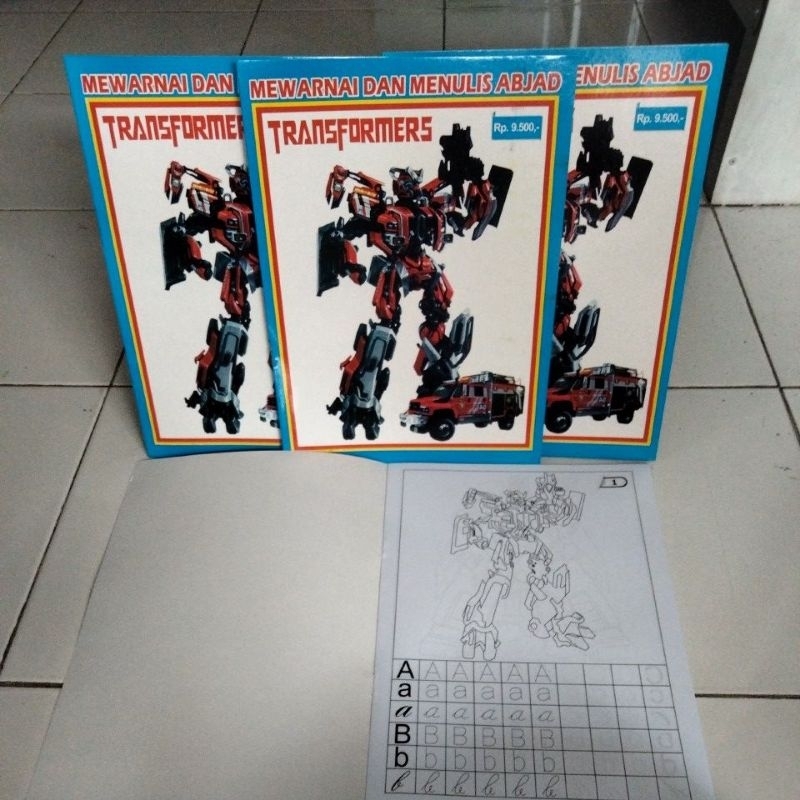 Jual Buku mewarnai dan menulis abjad seri Transformers untuk anak paud