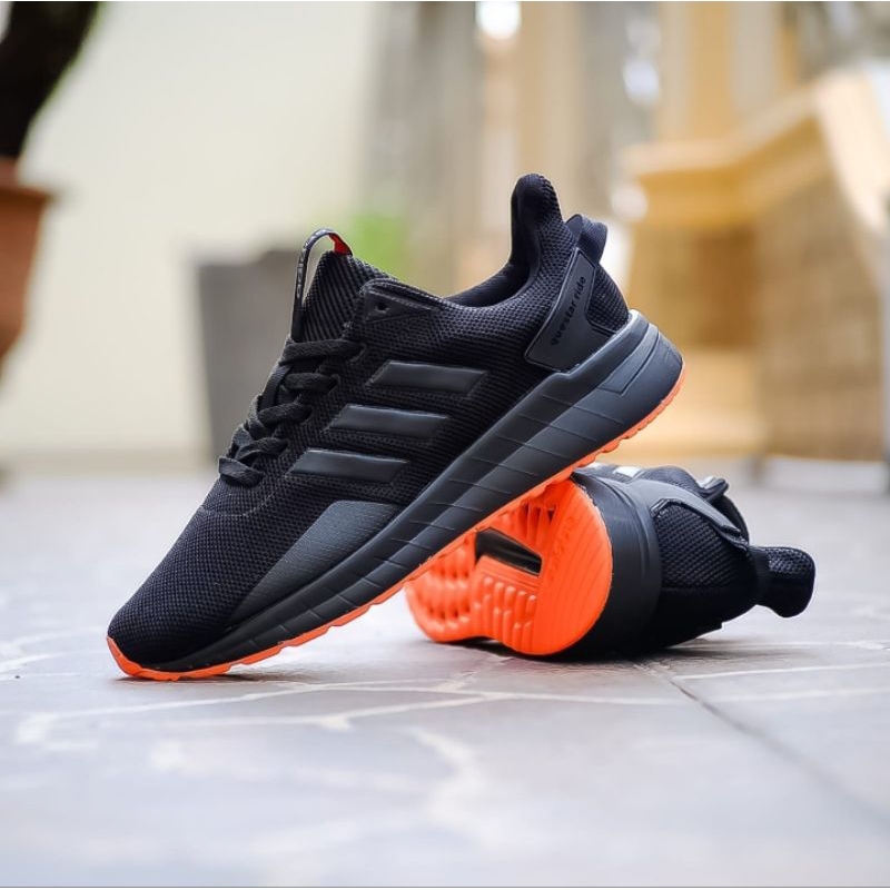Adidas questar ride black orange sales