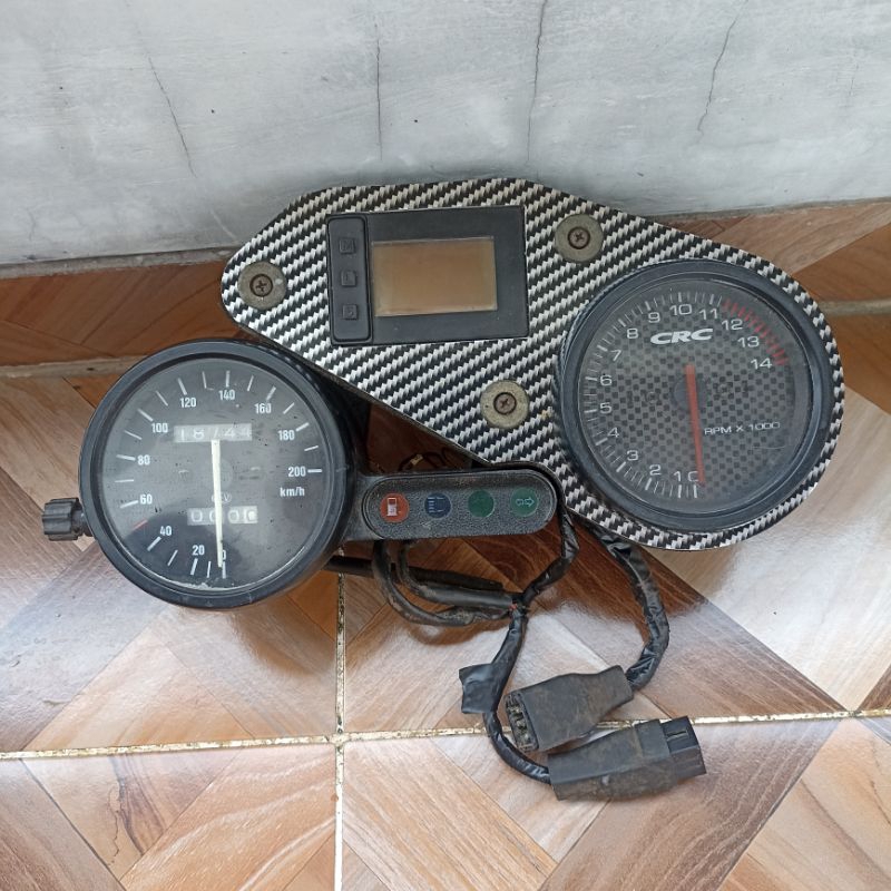 Aprilia Speedometer Cover – Bottom, Black – OEM AP8248653 – For SR 50