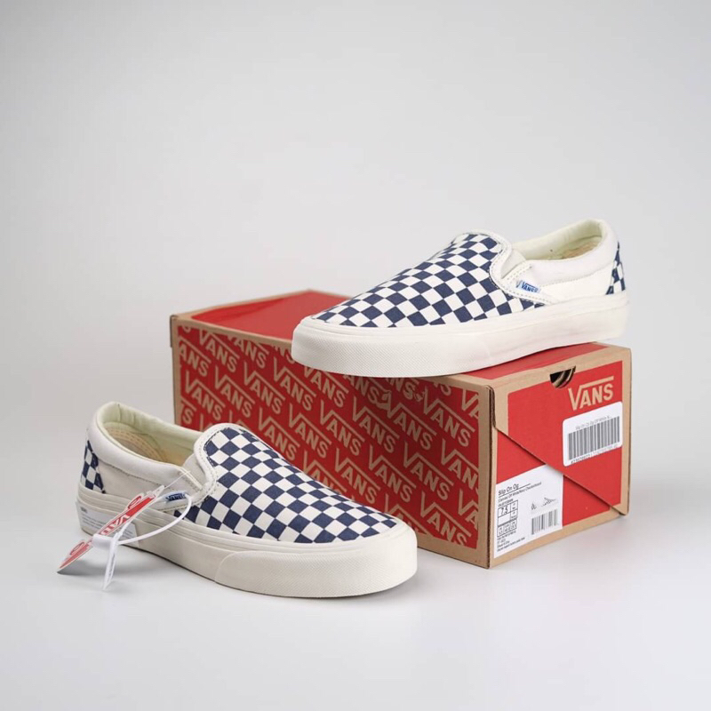 Navy checkerboard slip hot sale on vans