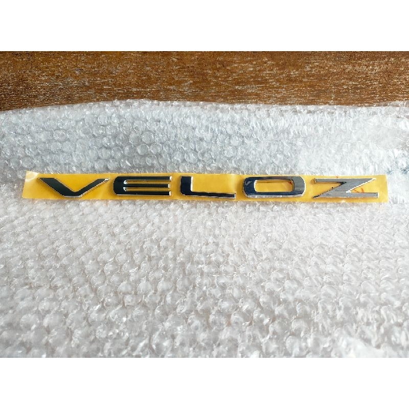 Jual Emblem Tulisan Kap Mesin Veloz 2022 original | Shopee Indonesia