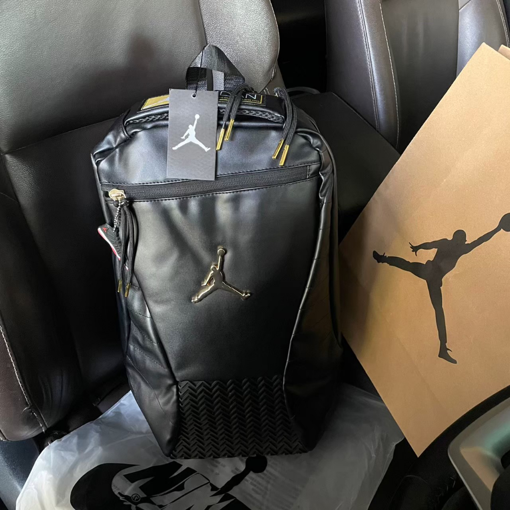 Jordan retro 12 cheap backpack black and gold