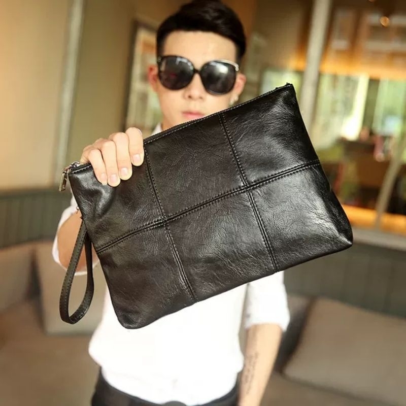 Lv pouch /clutch trunk original 1000 persen, Fesyen Pria, Tas & Dompet ,  Tas Selempang di Carousell