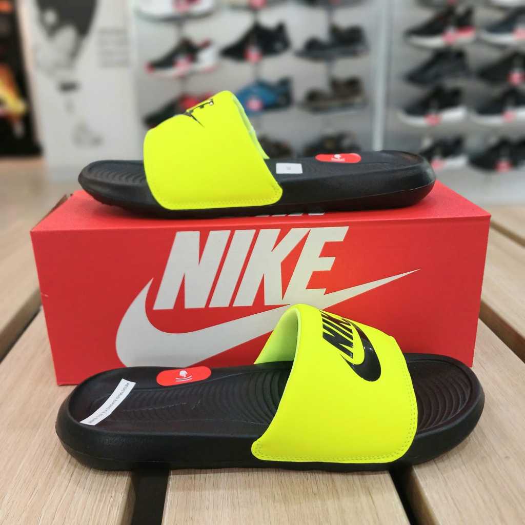 Neon green slides nike clearance