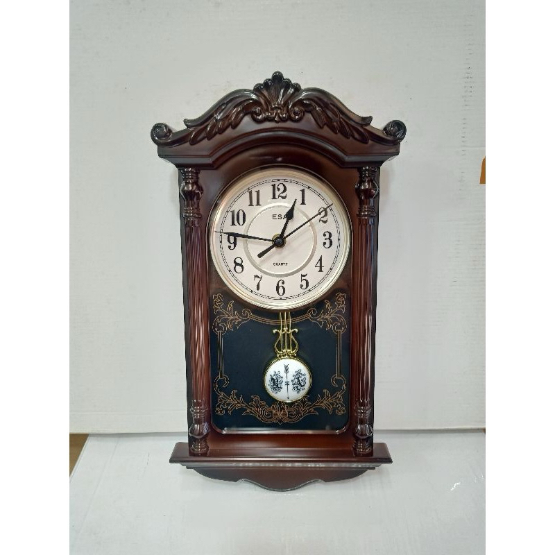 Jual jam dinding bandul dan musik perjam ,merk esa motif kayu ukuran ...
