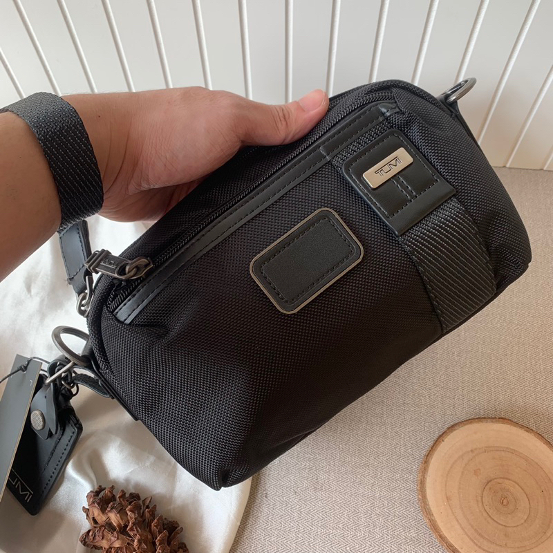 Clutch tumi best sale