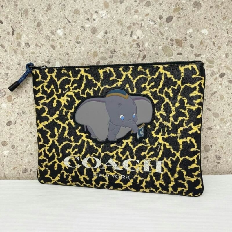Jual COACH X DISNEY LARGE WRISTLET WITH NAVY ANIMAL PRINT AND DUMBO