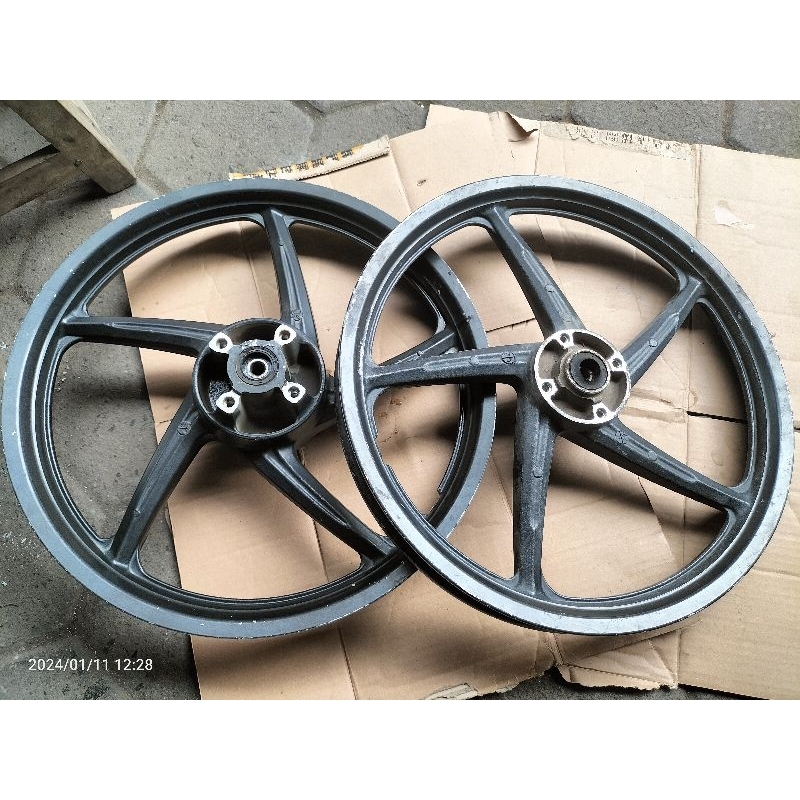 125 double disk supra x 125 velg tk