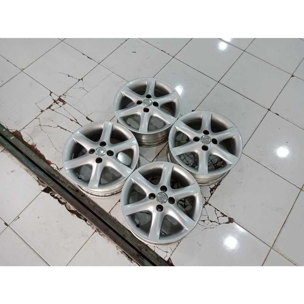 Jual 4 pcs velg oem toyota altis r15 pcd 4x100 silver seken murah ...