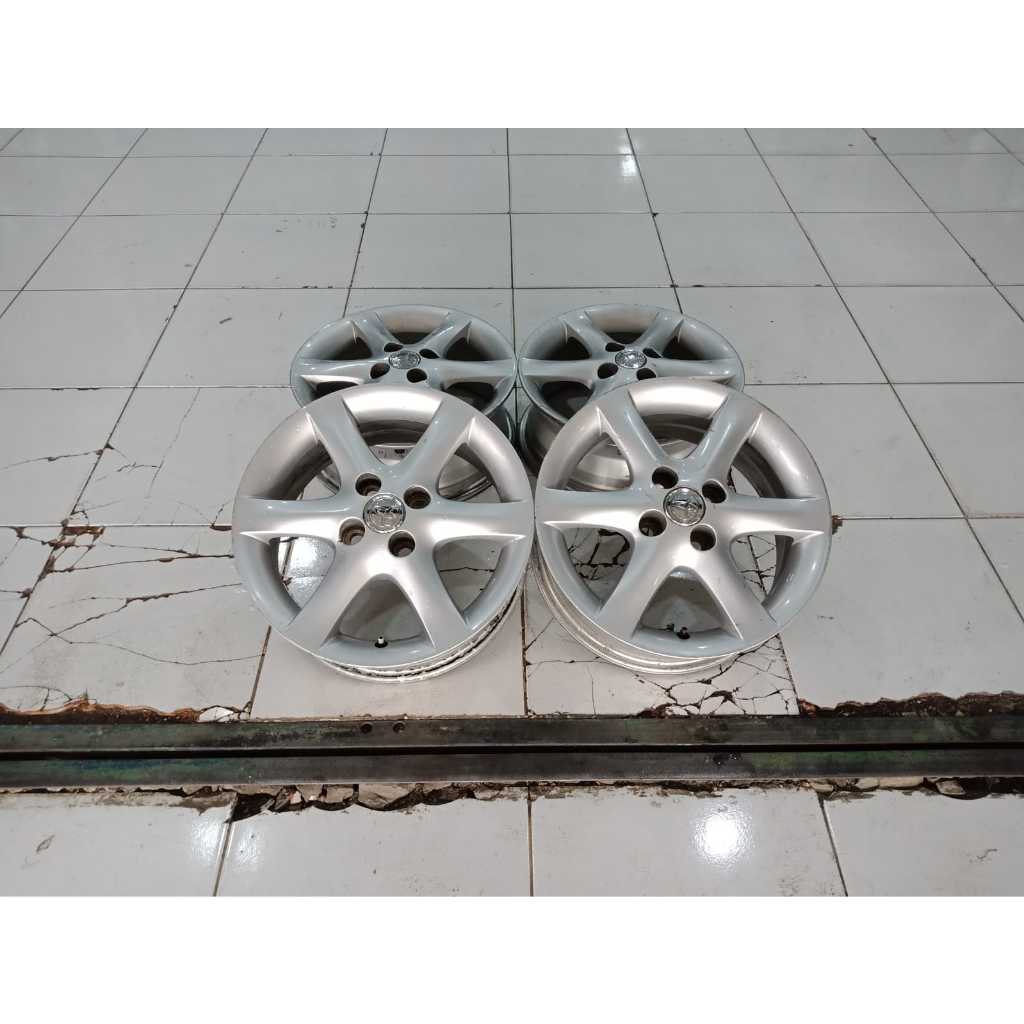 Jual 4 pcs velg oem toyota altis r15 pcd 4x100 silver seken murah ...