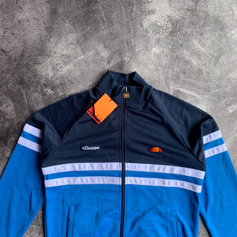 Harga tracktop ellesse store