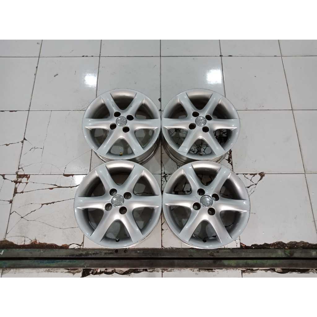 Jual 4 pcs velg oem toyota altis r15 pcd 4x100 silver seken murah ...
