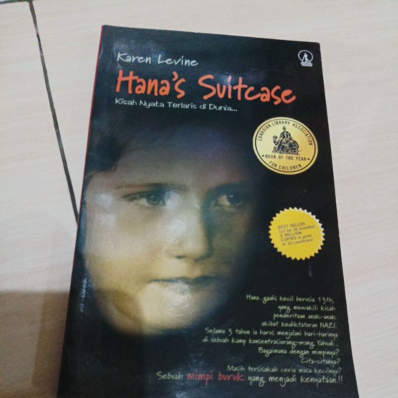 Jual buku kisah nyata true stories hana's suitcase Karen Levine bekas ...