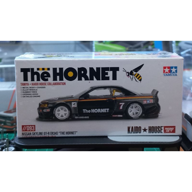 Modellino Kaido House Mini GT 1/64 Nissan Skyline GT-R (R34) 'The Hornet' Tamiya, Nero Sigillato