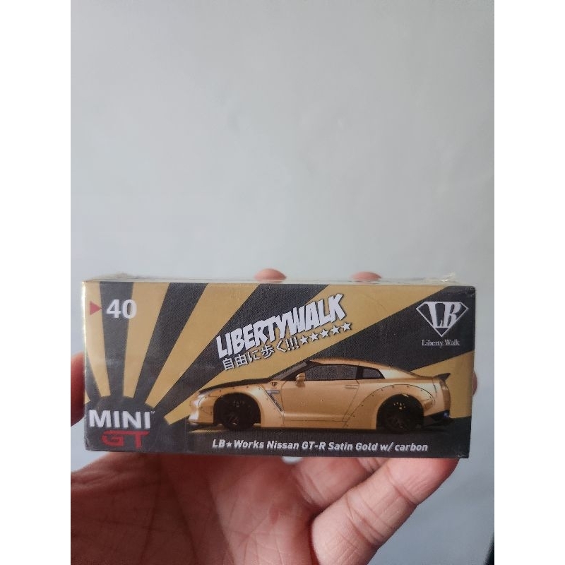 Jual Mini GT 40 Nissan GT-R R35 Type 1 Ducktail Satin Gold | Shopee ...