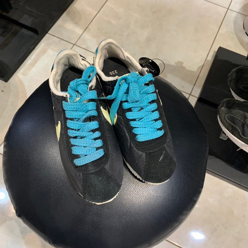 nike cortez blue and yellow