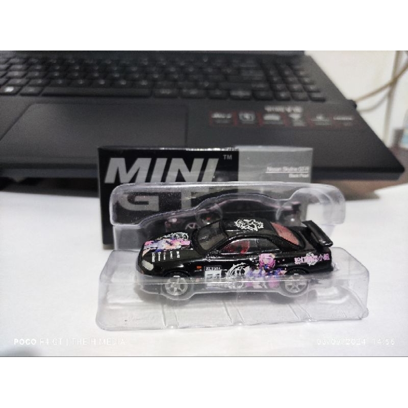MiniGT #570 Nissan Skyline GT-R (R34) V-Spec Black Pearl-Xe mô hình tỷ