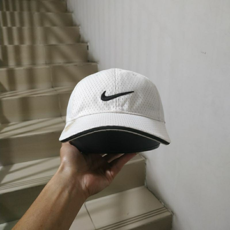 Topi nike golf sales