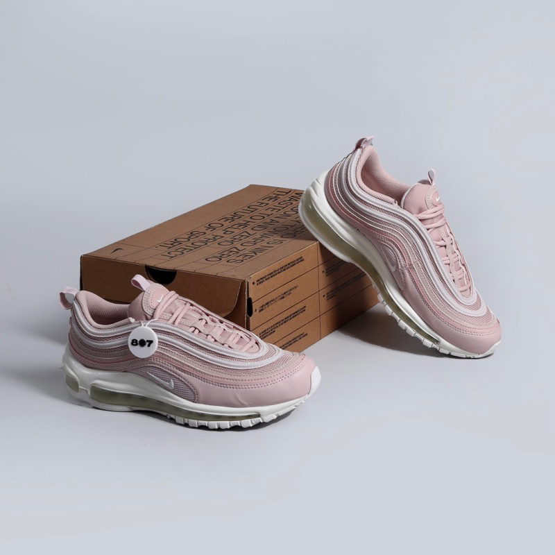 white and pink nike 97