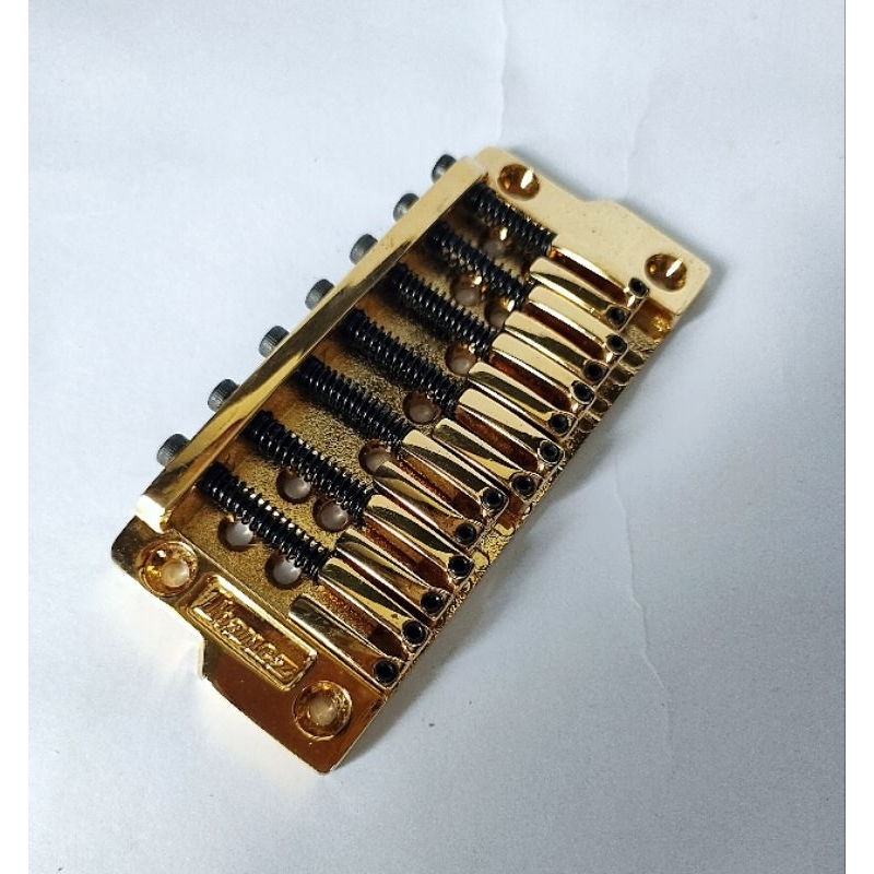 Jual Bridge Ibanez Gibraltar GOLD 7 string Original | Shopee Indonesia
