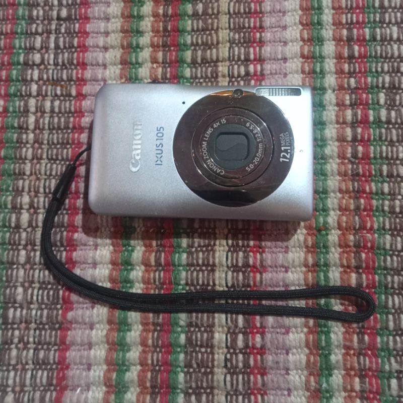 une baignoire désinvolte Titre canon ixus 105 lit télescope acide