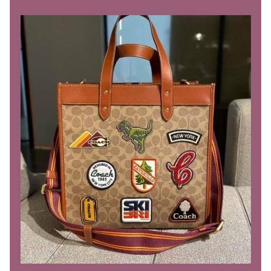 Field tote 40 in discount signature canvas with souvenir patches