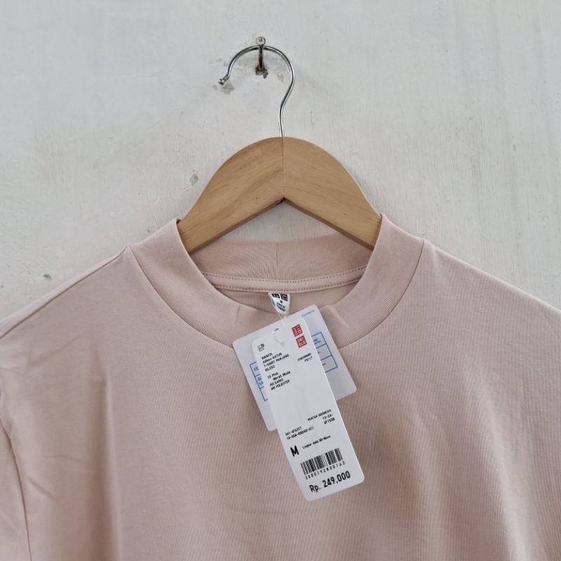 Jual UNIQLO WANITA KAOS AIRISM KATUN RILEKS PANJANG 10 PINK BARU ASLI ...