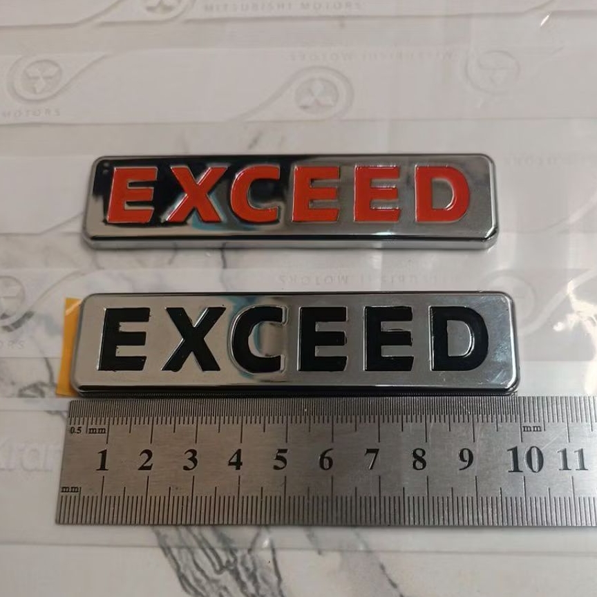 Jual emblem EXCEED MITSUBISHI ORIGINAL PAJERO SPORT TRITON XPANDER ...