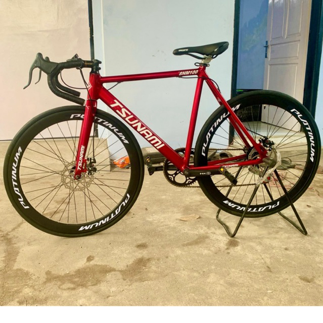 Jual Sepeda Tsunami merah Candy Roadbike steel | Shopee Indonesia