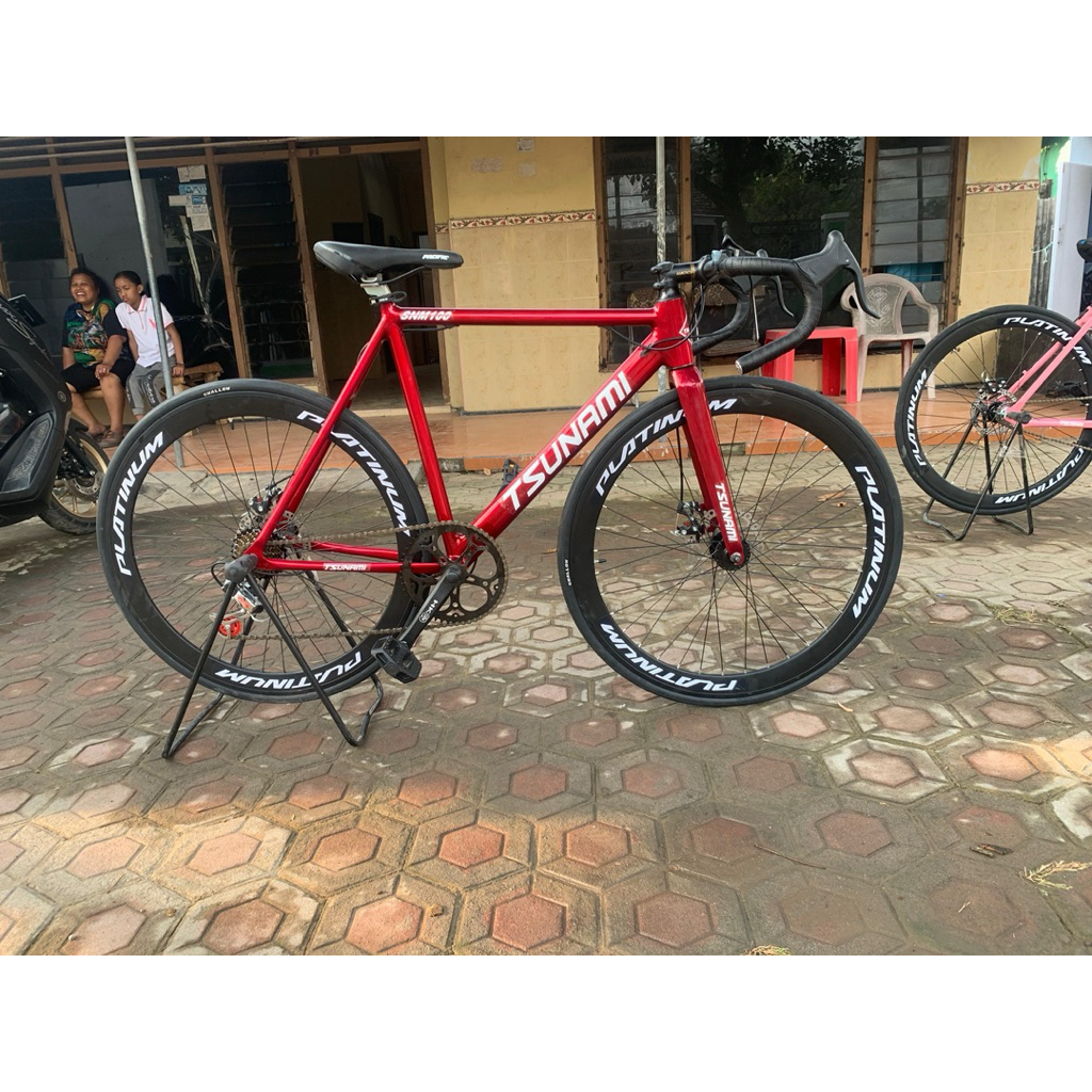 Jual Sepeda Tsunami merah Candy Roadbike steel | Shopee Indonesia