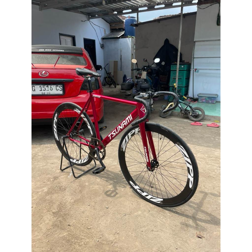 Jual Sepeda Fixie tsunami snm 100 merah candy velg zipp | Shopee Indonesia
